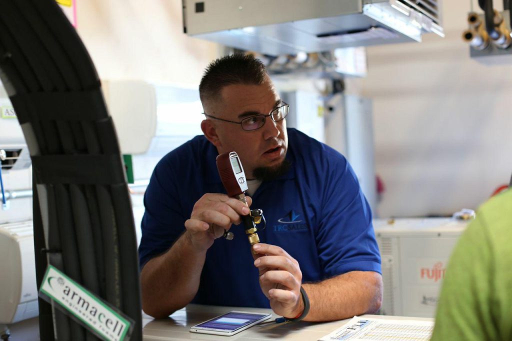 Technician showing item